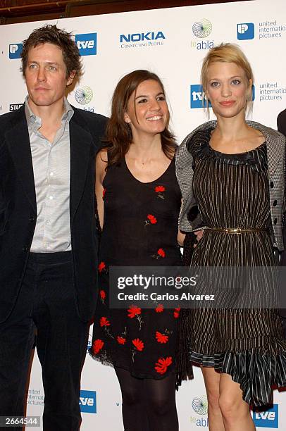 Actor Hugh Grant, actress Lucia Moniz and actress Heike Makatsch attend the premiere of their new movie "Love Actually" at Palacio de la Musica...