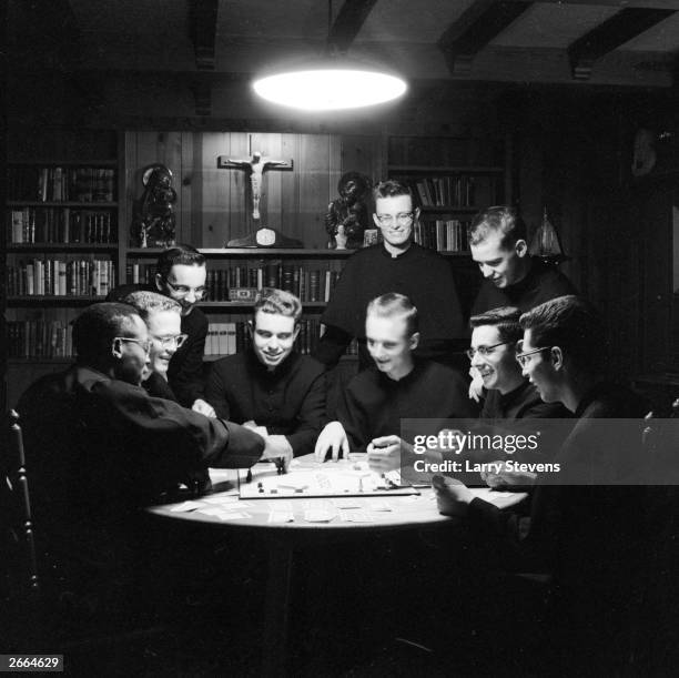 Monks enjoying a game of Monopoly.