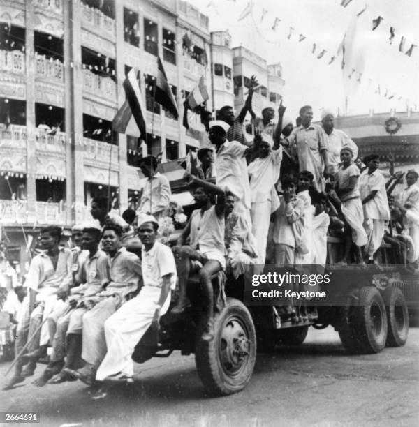 Citizens celebrate India's independence from British rule in the streets of Calcutta.