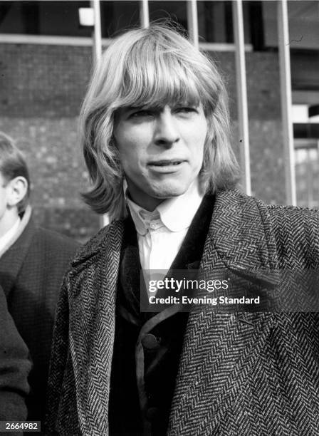 English singer-songwriter David Bowie , then still known as Davy Jones, at BBC TV Centre, London, March 1965. Jones and his group, The Manish Boys,...