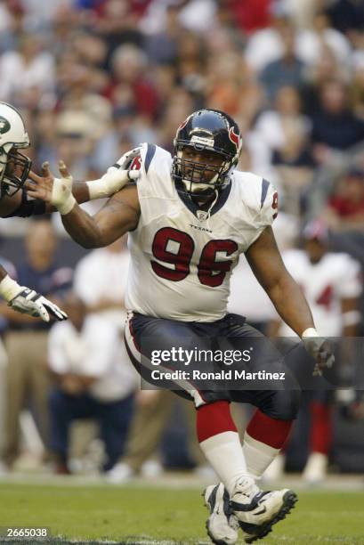 Gary Walker of the Houston Texans prepares to tackle against the New York Jets at Reliant Stadium on October 19, 2003 in Houston, Texas. The Jets...