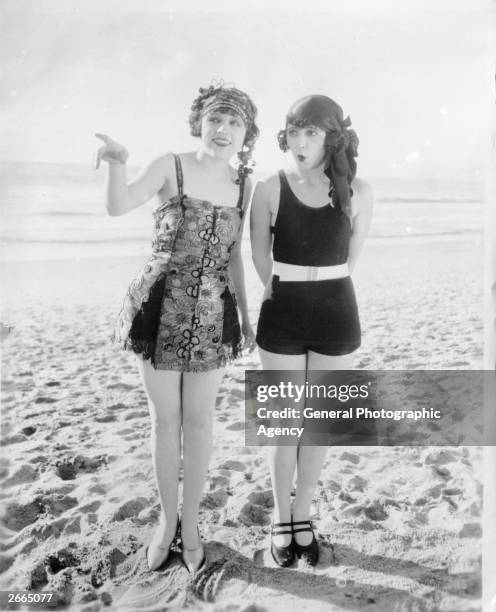 Two Mack Sennett girls or 'Bathing Beauties' on the beach.