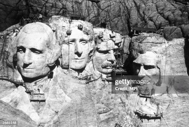 The memorial at Mount Rushmore, South Dakota under construction. The four heads are those of Presidents George Washington , Thomas Jefferson ,...