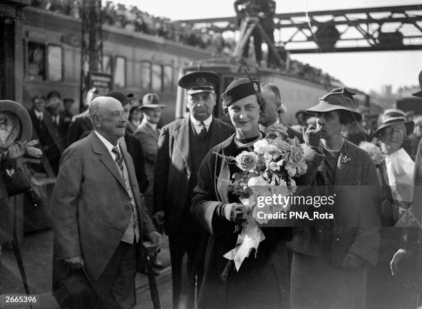 Marina, Princess of Greece and Denmark, is greeted by crowds on her arrival at the English port of Folkestone. She is to marry the Duke of Kent in...