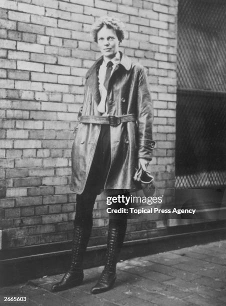 Amelia Earhart , American aviator, noted for her flights across the Atlantic and Pacific oceans and her attempt to fly around the world.