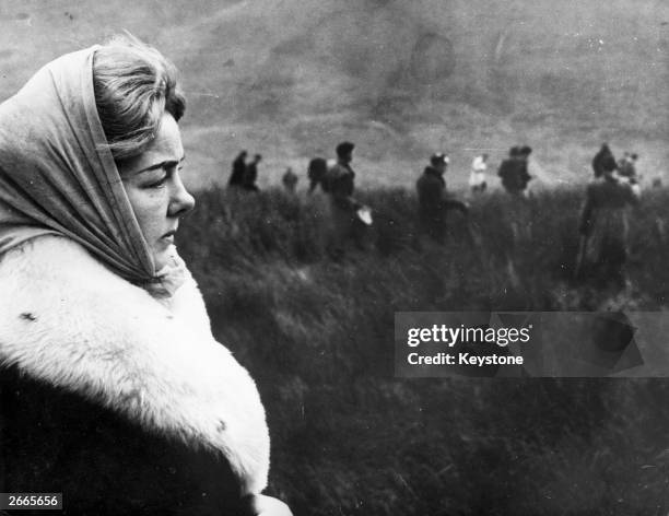 Mrs Ann Downey watching the police search Saddleworth moors for the body of her daughter Lesley, a victim of the Moors Murderers Ian Brady and Myra...