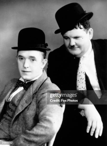 Stan Laurel , born Arthur Stanley Jefferson and Oliver Hardy , famous film comedians.