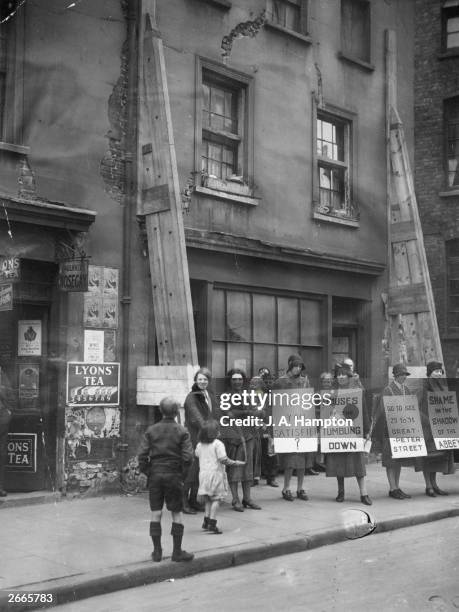 Protest against slum housing in Great Peter Street near Westminster Abbey, London.