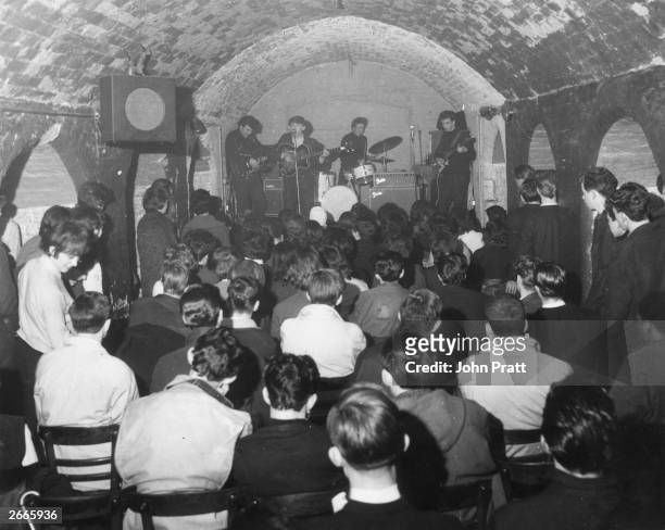 Packed crowd watching the Merseybeats playing at Liverpool's Cavern Club.