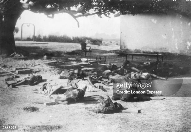 The burned corpses of 21 policeman who were thrown into a fire by some of Gandhi's followers at Chauri Chaura as retaliation for an incident where...