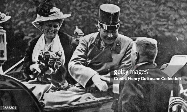 Franz Ferdinand, archduke of Austria, and his wife Sophie riding in an open carriage at Sarajevo shortly before their assassination.