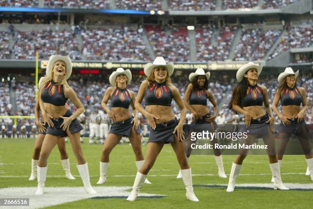 Cheerleaders of the Houston Texans perform during a game against the New York Jets at Reliant Stadium on October 19, 2003 in Houston, Texas. The Jets...