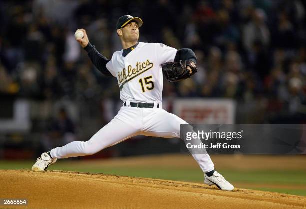 Tim Hudson of the Oakland A's pitches against the Boston Red Sox during the first inning of Game 1 of the 2003 American League Division Series on...
