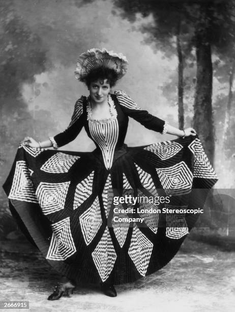 Actress, dancer and singer Lottie Collins curtseying. She is famous for the song 'Ta Ra Ra Boom De Ay!'