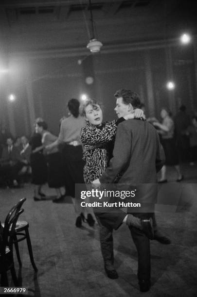 Couple dancing the Jitterbug to the sounds of the Dixieland band the 'Vieux Carre Boys', at Club Martinique, a new jazz club in Newcastle, April...