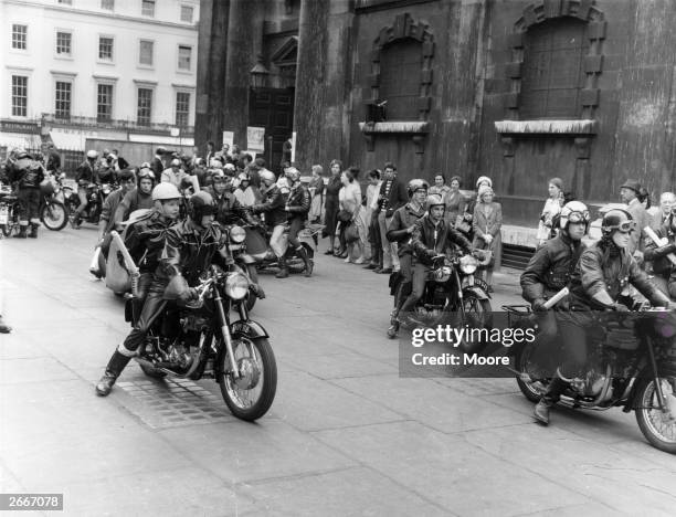 Members of the 59 Club, a motorcycle club started by the Reverend William Shergold, outside St. Martin-in-the-Fields, Trafalgar Square, London, ready...