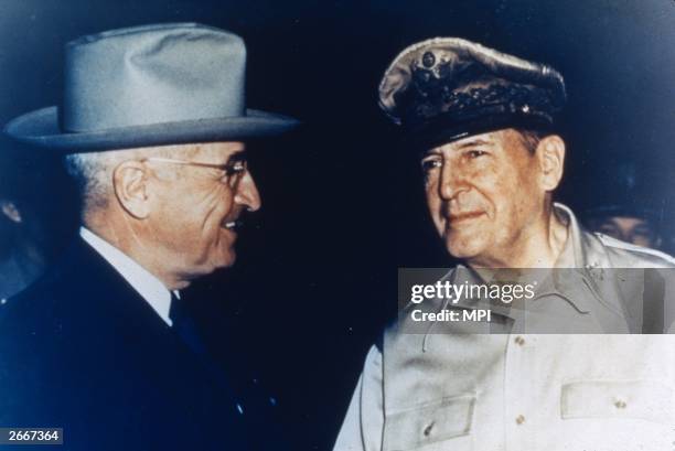View of US President Harry S Truman and US military commander General Douglas MacArthur on Wake Island in the pacific. Truman dismissed MacArthur...