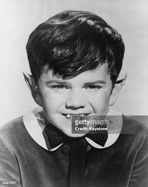 Fitted with pointed ears and a toothy smile, eleven year old Butch Patrick is to play Eddy, the youngest member of the Munsters, a TV series to be...