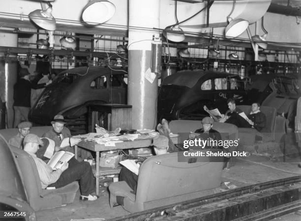 Members of the nascent United Auto Workers Union during a sit-down strike in the General Motors Fisher Body Plant in Flint, Michigan.