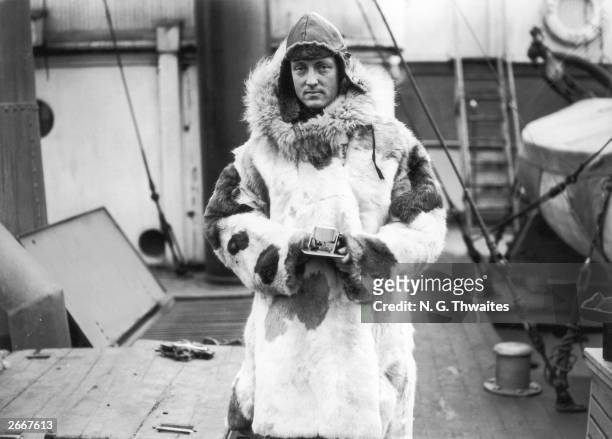 Commander Richard Evelyn Byrd , holding a sundial compass during a trip to the Antarctic. The American explorer, author, aviator and US Naval...