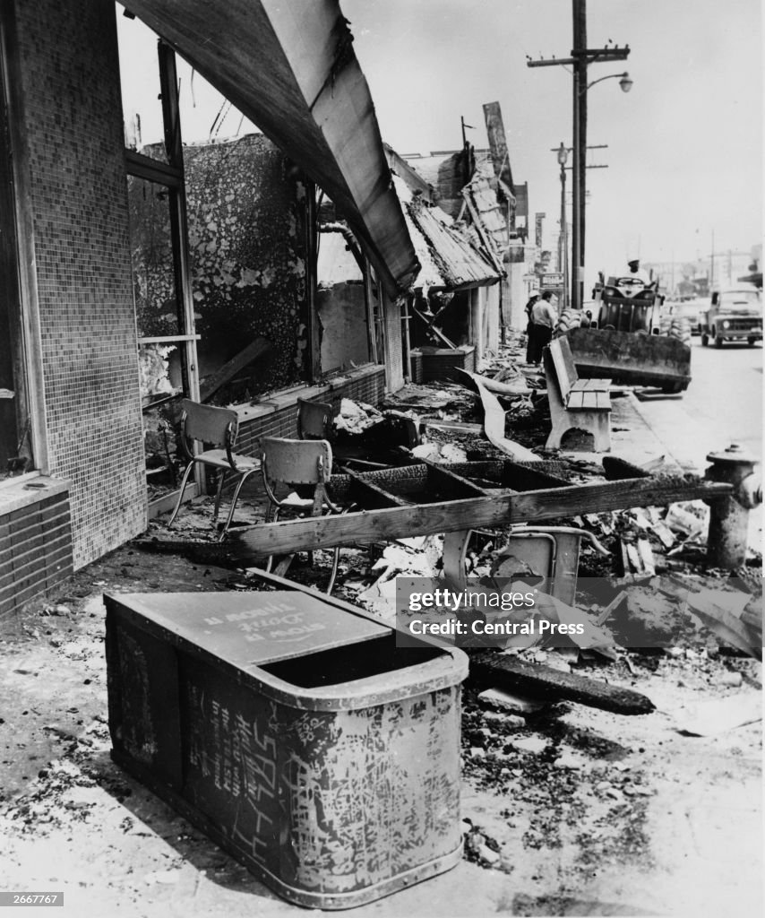 59 Riot Aftermath A bulldozer clears debris in the aftermath of racially motivated ...