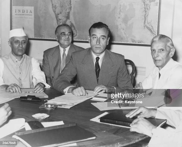 At the conference in New Delhi where Lord Mountbatten disclosed Britain's partition plan for India Indian nationalist leader Jawaharlal Nehru ,...