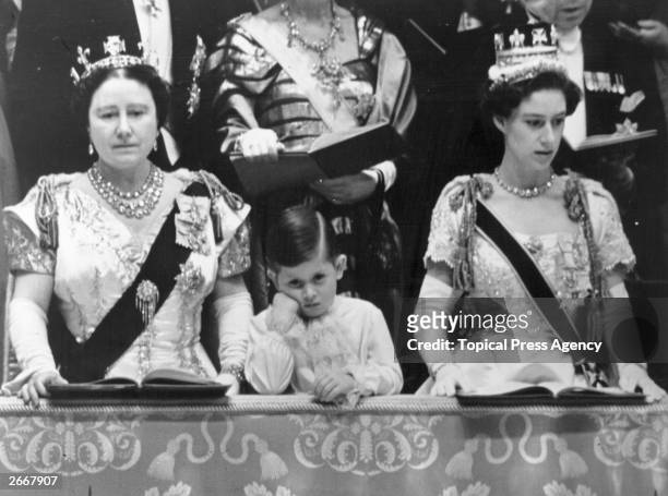 Queen Elizabeth Queen Mother and Prince Charles with Princess Margaret Rose in the royal box at Westminster Abbey watching the coronation ceremony of...