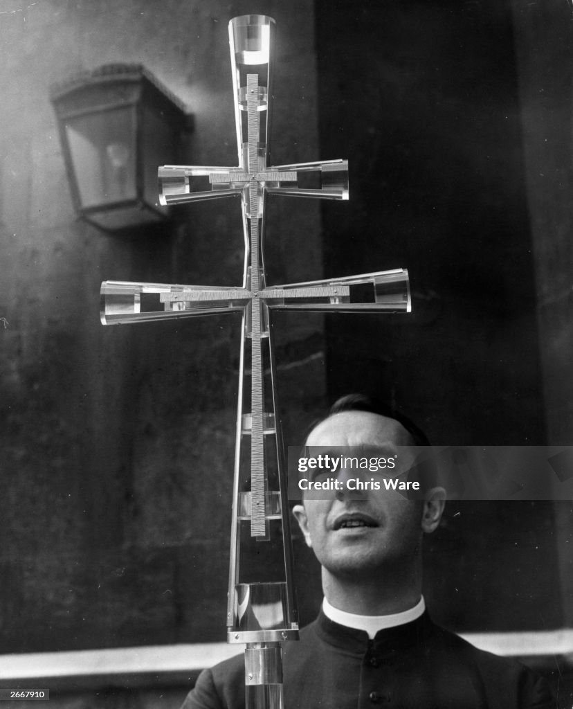 Primatial Cross The Archbishop of Canterbury's chaplain the Rev John Andrew with a ...