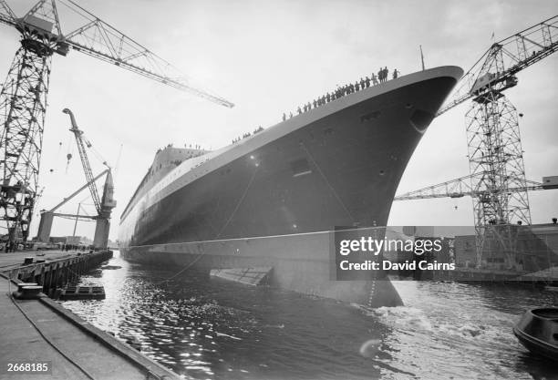 The launch of the new Cunard flagship Queen Elizabeth II from the Upper Clyde Shipbuilders yard, Clydebank. The QE2 as she became known was the last...