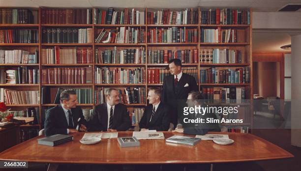 The Rockefeller brothers in their Radio City, New York office. Left to right, Laurance , Winthrop , John D. Rockefeller III , David, and Nelson ....