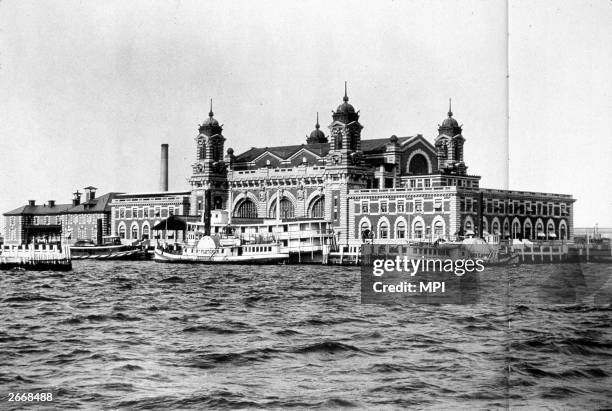 View of Ellis Island in New York Bay, run by the US Immigration Service. Between 1892 and 1954 over 20 million immigrants to the USA passed through...