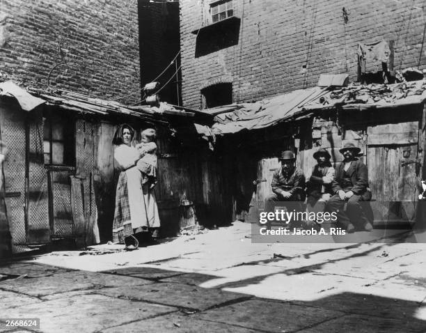 Italian immigrant families in New York on Jersey Street, living in shacks.