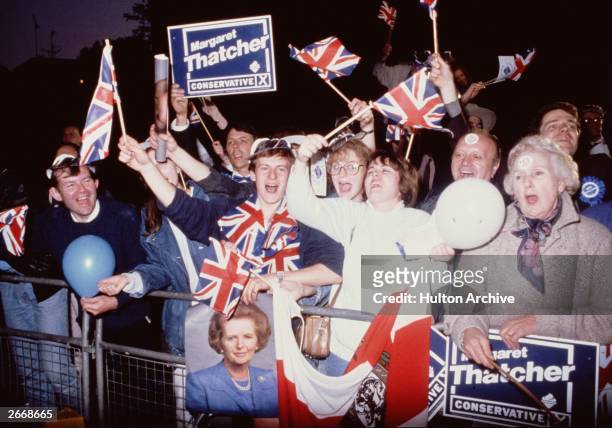 Supporters of Prime Minister Margaret Thatcher on the night when the Conservative Party won its third consecutive election on June 11, 1987 in United...