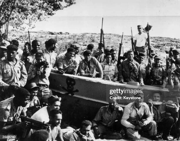 Cuban militiamen and members of the Revolutionary Army celebrating their victory over US mercenaries at Playa Giron, in what became known as the Bay...