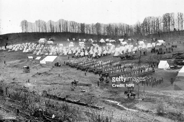 Members of the Union Army's 96th Pennsylvanian Regiment carry out a drill at Camp Northumberland outside Washington DC.
