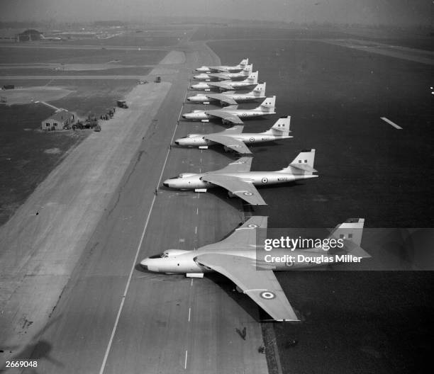 Eight Vickers Valiant 4-jet bombers, part of Britain's first atomic bomb squadron prepare for a training take-off at the RAF airfield in Gaydon,...