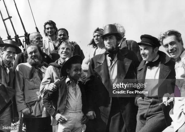 The cast and crew of the Warner Brothers film 'Moby Dick' on location in Youghal, County Cork. Members include Richard Basehart, Gregory Peck as...