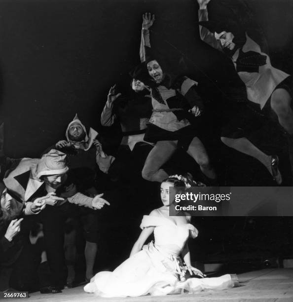 Liane Dayde and dancers playing the Seven Dwarfs in a Paris Ballet Opera production of 'Blanche Neige'. Music is by Maurice Yvain, decor by D...