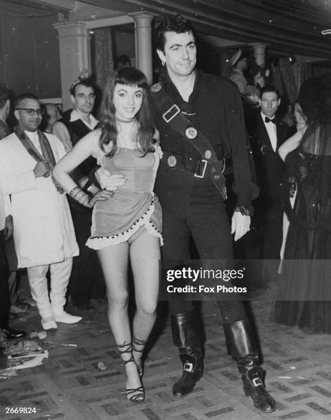 Film stars Joan Collins and Maxwell Read at Chelsea Arts Ball at the Royal Albert Hall, London.