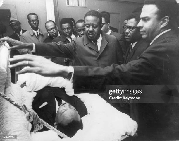 American civil rights leader Dr Martin Luther King Jr. Lying in state in Memphis, Tennessee, as his colleagues pay their respects to him ; Andrew...