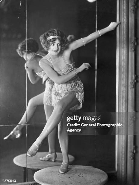 Bee Jackson, world Charleston dance champion perfoming in front of a mirror. Jackson was the first dancer to popularize the Charleston with white...