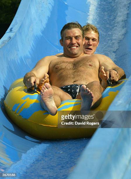 Jason Leonard and Josh Lewsey of England enjoy the waterslide at the Wet 'n' Wild theme park October 28, 2003 the Gold Coast, Australia.
