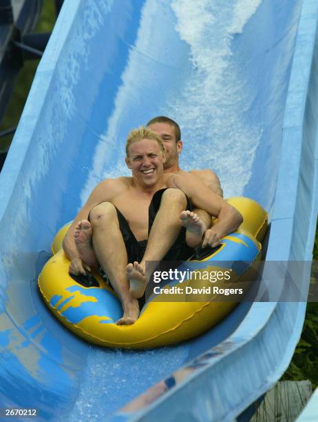 Lewis Moody and Joe Worsley of England enjoy the waterslide at the Wet 'n' Wild theme park, on October 28, 2003 the Gold Coast, Australia.