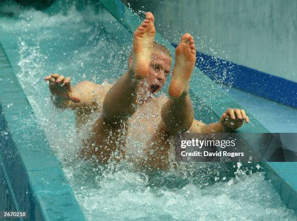 Iain Balshaw of England enjoys the waterslide at the Wet 'n' Wild theme park October 28, 2003 the Gold Coast, Australia.