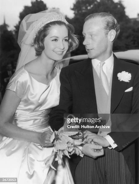Robin Douglas-Home and model Sandra Paul after their wedding at St. James' Church, Piccadilly, 9th July 1959. Sandra Paul's third marriage was to...
