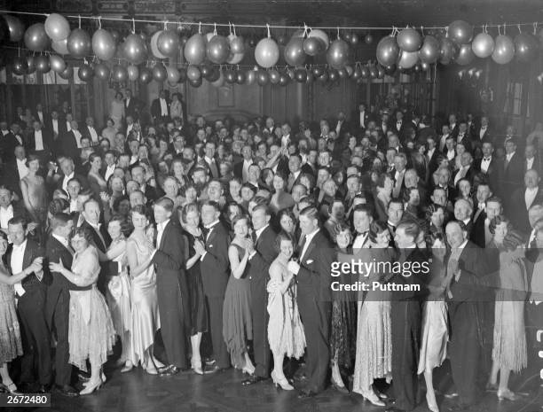 Guests dancing in the ballroom aboard Cunard liner 'Berengaria' at Southampton Docks. They are attending a dance and cabaret to raise funds for...