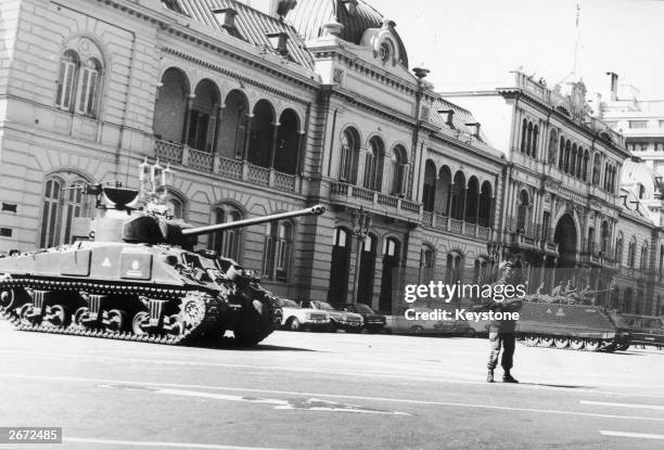 Argentinian soldiers stand guard outside Government House, , after the coup which deposed President Isabel Martinez de Peron, widow of the late...