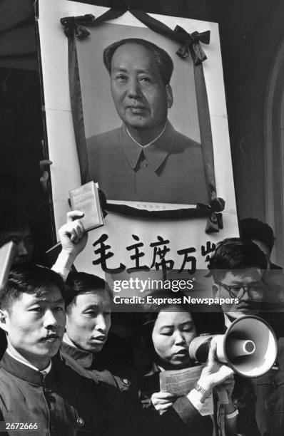 Chinese demonstrators at a 'Little Red Book' protest outside the London Embassy, regarding Chairman Mao Tse Tung's book of quotations.