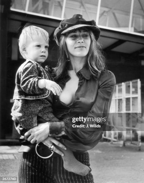 Anita Pallenberg, ex-girlfriend of Rolling Stone Brian Jones, and current partner of Rolling Stones guitarist Keith Richards with their baby, Marlon,...