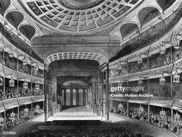 The auditorium and stage of the New Covent Garden Theatre in London, better known as the Royal Opera House or Covent Garden Opera House. Original...
